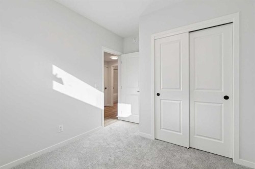 572 Belmont Heath Sw, Calgary, AB - Indoor Photo Showing Other Room
