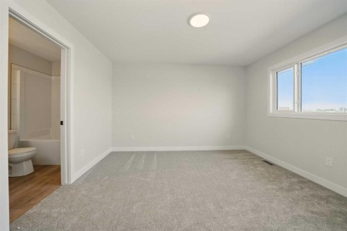 57 Pinnacle Close, Blackfalds, AB - Indoor Photo Showing Other Room