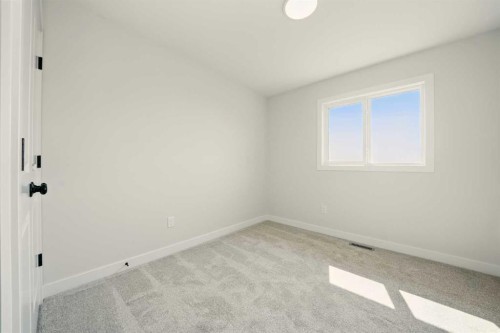 57 Pinnacle Close, Blackfalds, AB - Indoor Photo Showing Other Room