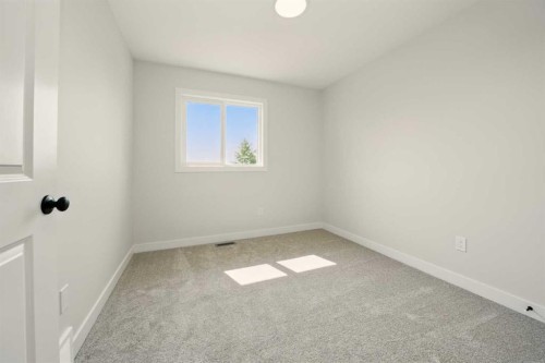 57 Pinnacle Close, Blackfalds, AB - Indoor Photo Showing Other Room