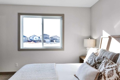 120 Hampton Crescent, Sylvan Lake, AB - Indoor Photo Showing Bedroom