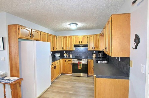 97 Cunningham Crescent, Red Deer, AB - Indoor Photo Showing Kitchen
