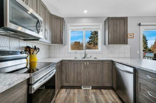12 Rutherford Drive, Red Deer, AB - Indoor Photo Showing Kitchen With Double Sink