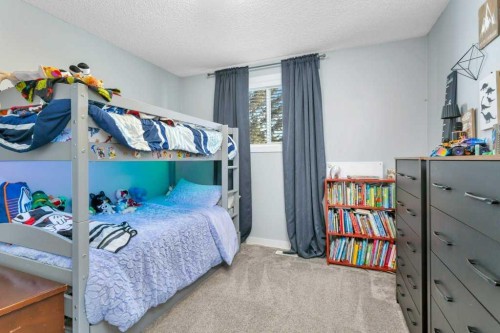 12 Rutherford Drive, Red Deer, AB - Indoor Photo Showing Bedroom