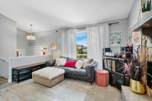12 Rutherford Drive, Red Deer, AB - Indoor Photo Showing Living Room With Fireplace