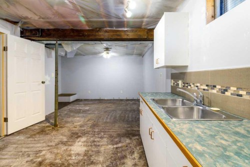 2203 25 Avenue, Delburne, AB - Indoor Photo Showing Kitchen With Double Sink