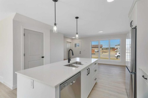 153 Athens Road, Blackfalds, AB - Indoor Photo Showing Kitchen With Double Sink