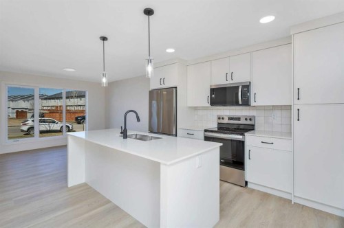 153 Athens Road, Blackfalds, AB - Indoor Photo Showing Kitchen With Upgraded Kitchen