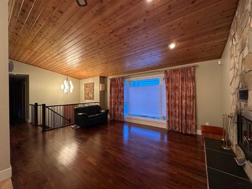 5908 57 Avenue, Ponoka, AB - Indoor Photo Showing Other Room With Fireplace