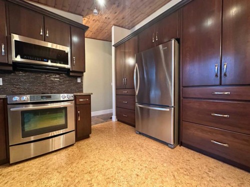 5908 57 Avenue, Ponoka, AB - Indoor Photo Showing Kitchen With Stainless Steel Kitchen