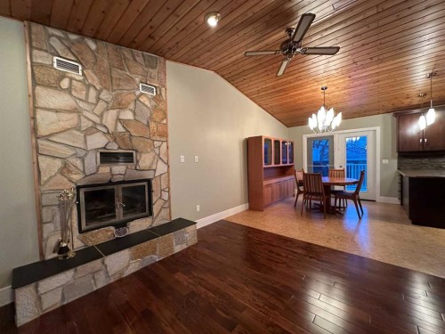 5908 57 Avenue, Ponoka, AB - Indoor Photo Showing Living Room With Fireplace