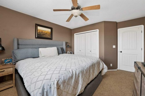 26 Lucky Place, Sylvan Lake, AB - Indoor Photo Showing Bedroom