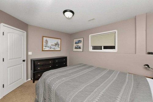 26 Lucky Place, Sylvan Lake, AB - Indoor Photo Showing Bedroom