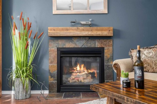 26 Lucky Place, Sylvan Lake, AB - Indoor Photo Showing Living Room With Fireplace