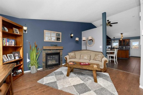 26 Lucky Place, Sylvan Lake, AB - Indoor Photo Showing Living Room With Fireplace