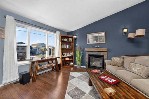 26 Lucky Place, Sylvan Lake, AB - Indoor Photo Showing Living Room With Fireplace