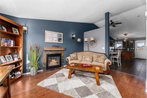 26 Lucky Place, Sylvan Lake, AB - Indoor Photo Showing Living Room With Fireplace