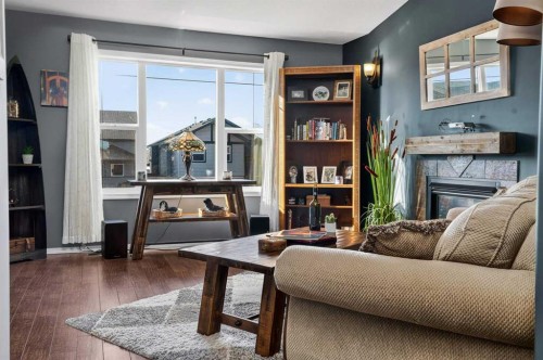 26 Lucky Place, Sylvan Lake, AB - Indoor Photo Showing Living Room With Fireplace