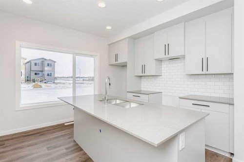 230 Heartwood Parade Se, Calgary, AB - Indoor Photo Showing Kitchen With Upgraded Kitchen