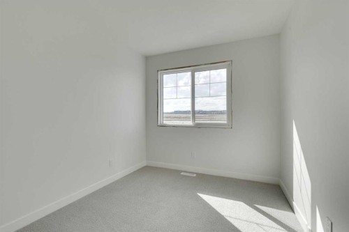 182 Lanark Gate Se, Airdrie, AB - Indoor Photo Showing Other Room