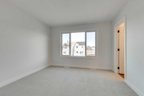 182 Lanark Gate Se, Airdrie, AB - Indoor Photo Showing Other Room