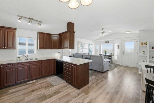 106 Bayshore Drive, Sylvan Lake, AB - Indoor Photo Showing Kitchen With Double Sink