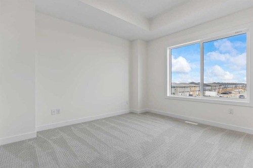 42 Corner Glen Manor Ne, Calgary, AB - Indoor Photo Showing Other Room