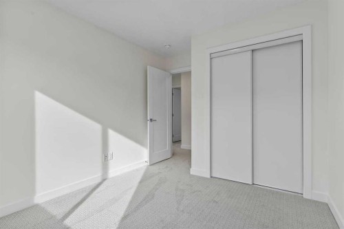 42 Corner Glen Manor Ne, Calgary, AB - Indoor Photo Showing Other Room