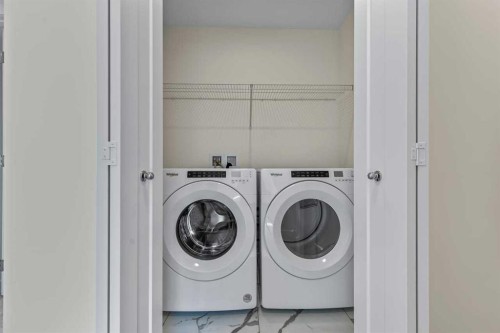 42 Corner Glen Manor Ne, Calgary, AB - Indoor Photo Showing Laundry Room