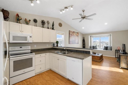 57 Garden Road, Lacombe, AB - Indoor Photo Showing Kitchen With Double Sink