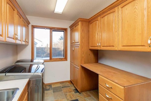 50 Coventry Lane, Lacombe, AB - Indoor Photo Showing Laundry Room