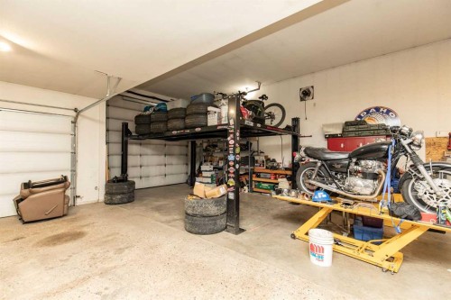 50 Coventry Lane, Lacombe, AB - Indoor Photo Showing Garage