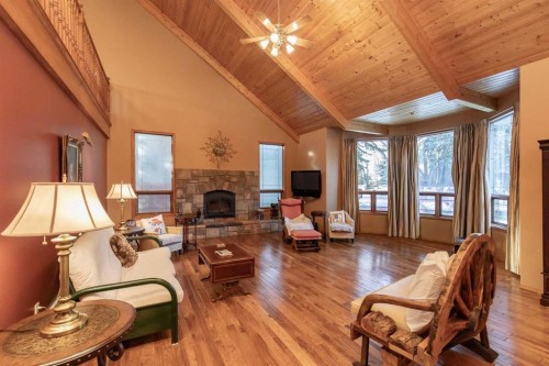 50 Coventry Lane, Lacombe, AB - Indoor Photo Showing Living Room With Fireplace