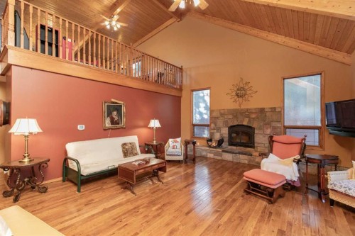 50 Coventry Lane, Lacombe, AB - Indoor Photo Showing Living Room With Fireplace