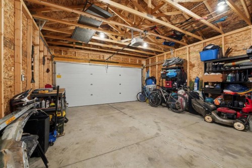 32 Station Drive, Sylvan Lake, AB - Indoor Photo Showing Garage
