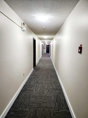 306-4811 55 Street, Red Deer, AB - Indoor Photo Showing Other Room