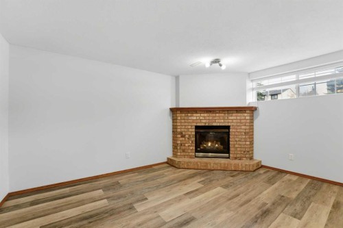 287 Cornett Drive, Red Deer, AB - Indoor Photo Showing Living Room With Fireplace