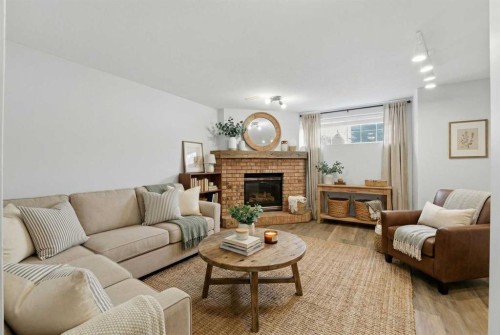 287 Cornett Drive, Red Deer, AB - Indoor Photo Showing Living Room With Fireplace