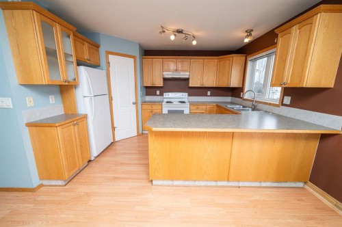 6209 Orr Drive, Red Deer, AB - Indoor Photo Showing Kitchen With Double Sink