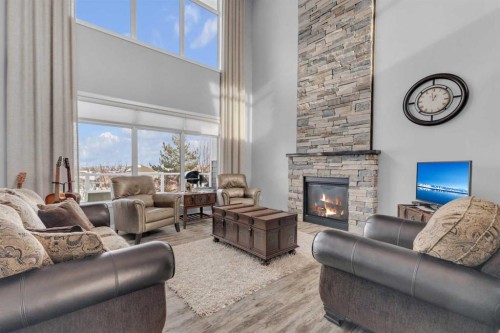 5 Leonard Close, Sylvan Lake, AB - Indoor Photo Showing Living Room With Fireplace