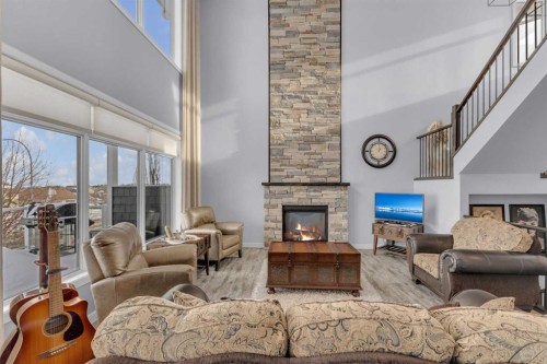 5 Leonard Close, Sylvan Lake, AB - Indoor Photo Showing Living Room With Fireplace