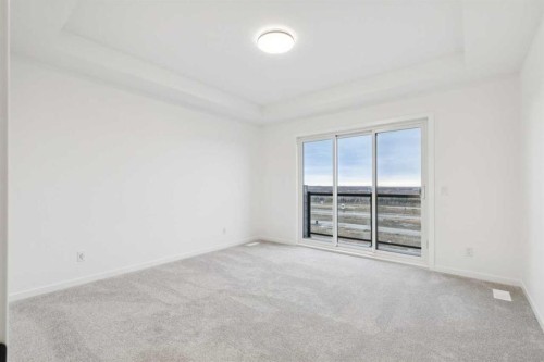 28 Bluerock Terrace Sw, Calgary, AB - Indoor Photo Showing Other Room