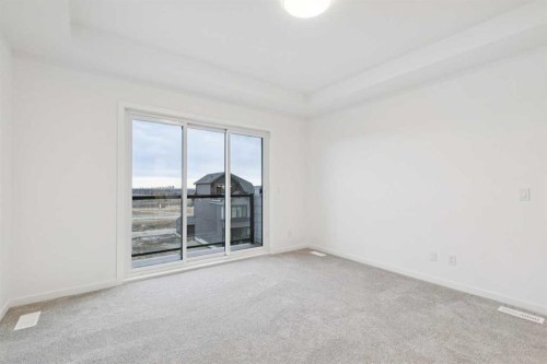 28 Bluerock Terrace Sw, Calgary, AB - Indoor Photo Showing Other Room