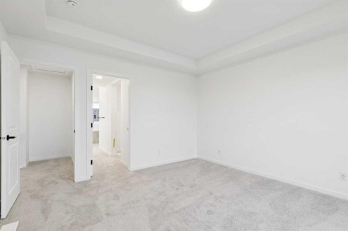28 Bluerock Terrace Sw, Calgary, AB - Indoor Photo Showing Other Room