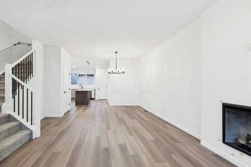28 Bluerock Terrace Sw, Calgary, AB - Indoor With Fireplace