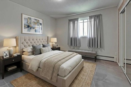 312-5330 47 Avenue, Red Deer, AB - Indoor Photo Showing Bedroom