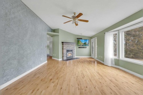 39228 Range Road 255, Rural Lacombe County, AB - Indoor With Fireplace