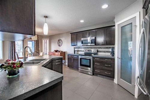 60 Vincent Close, Red Deer, AB - Indoor Photo Showing Kitchen With Stainless Steel Kitchen With Double Sink With Upgraded Kitchen