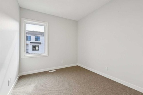 9 Treeline Avenue Sw, Calgary, AB - Indoor Photo Showing Other Room