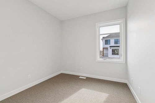 9 Treeline Avenue Sw, Calgary, AB - Indoor Photo Showing Other Room
